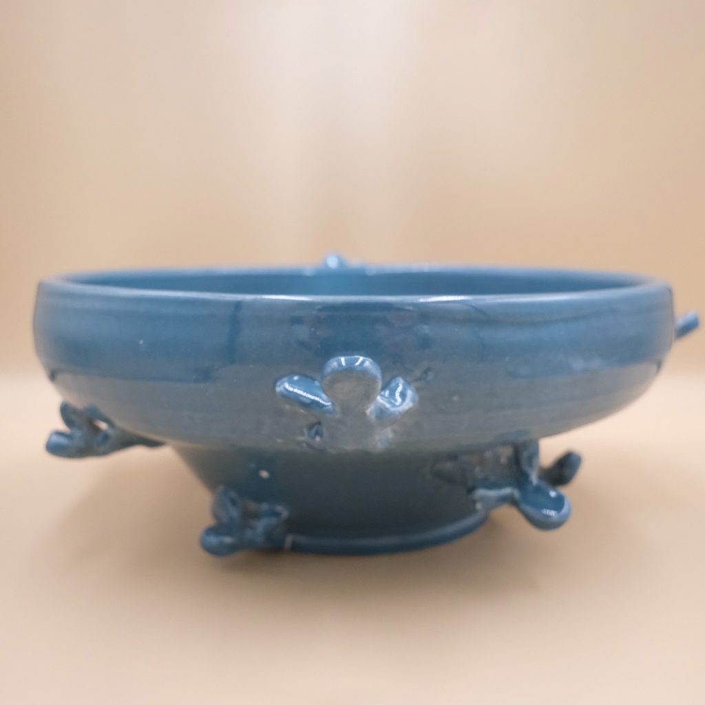 Ascendance ceramic platter with climbing figures