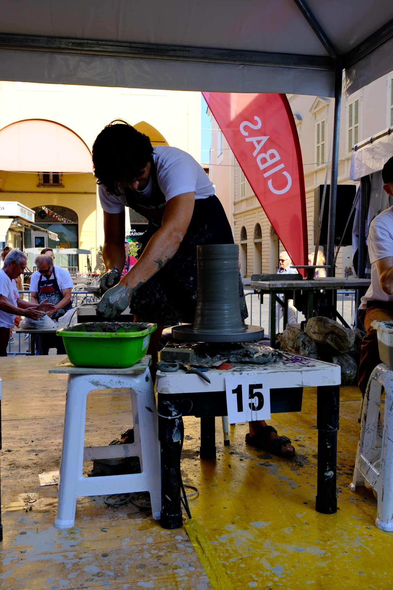 Daniel throwing a tall cylinder at station 15 during the 2026 Faenza competition